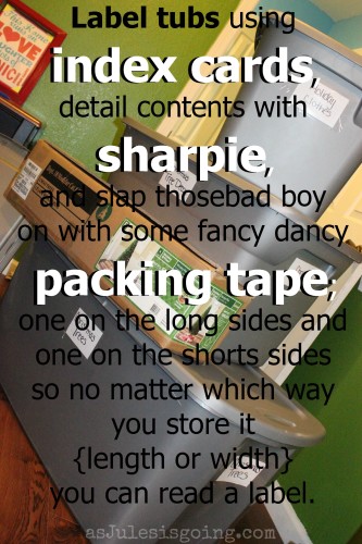 Label tubs using index cards, a sharpie, and packing tape