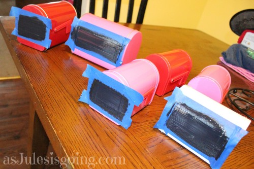 paint mini chalkboards on front and side of mailboxes to personalize them
